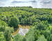 Étang de 2.600 m² sur terrain boisé de 23.000 m² - Dji 0508-2